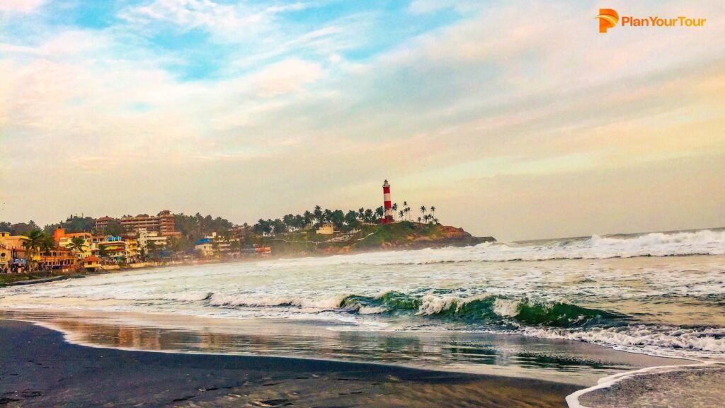 a beach with waves crashing on the shore : Kovalam Beach, Kerala
