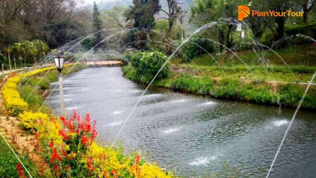 a water sprinklers spraying water into a river in Blossom Park
