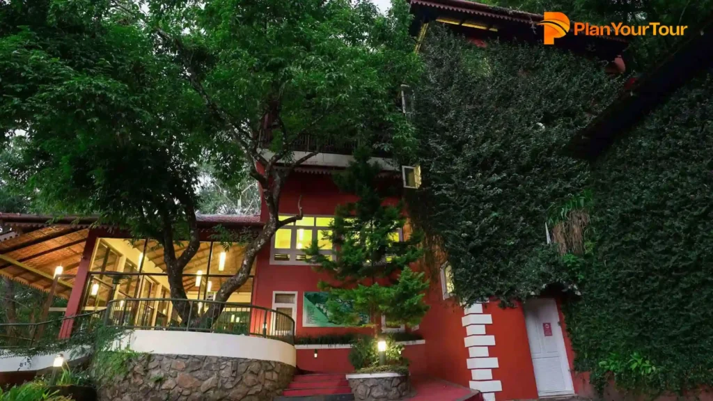 a house with trees around it of Tea Valley Resort Munnar, top resorts in Munnar
