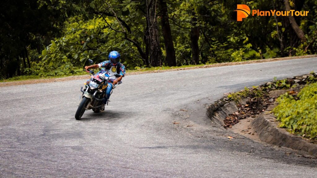 Gap Road Munnar scenic road with a motorcycle rider
