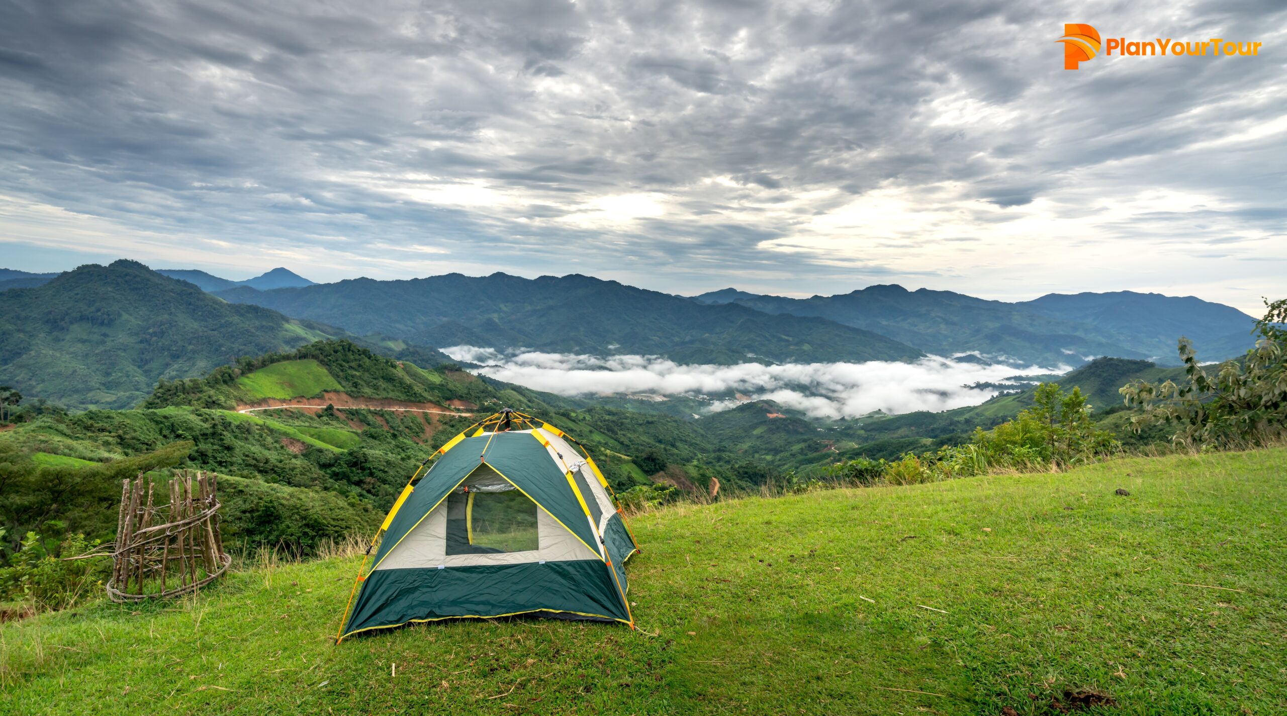 Munnar tent camping with scenic mountain views and lush green hills